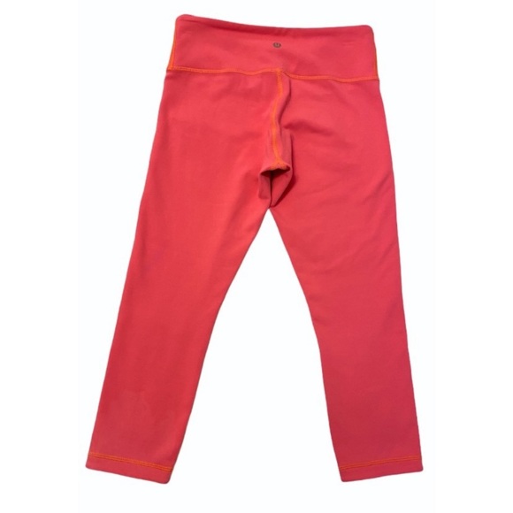 PRICE FIRM!! Lululemon hot coral cropped pants - Picture 2 of 7